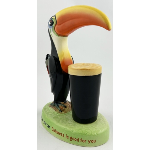 230 - GUINNESS TOUCAN BAR TOP FIGURE. 9ins tall. Toucan with drink upon a lettered base plinth. Note - thi... 