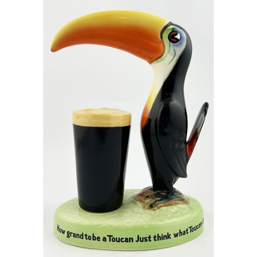 230 - GUINNESS TOUCAN BAR TOP FIGURE. 9ins tall. Toucan with drink upon a lettered base plinth. Note - thi... 