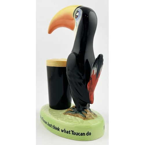 230 - GUINNESS TOUCAN BAR TOP FIGURE. 9ins tall. Toucan with drink upon a lettered base plinth. Note - thi... 