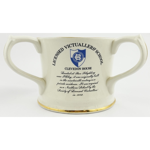 232 - 1983 GUINNESS YEAR CUP FOR LICENSED VICTUALLERS SCHOOL. 4.5ins tall. 3 different sides. CLEVEDON HOU... 