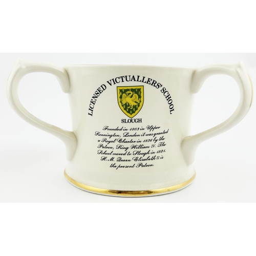 232 - 1983 GUINNESS YEAR CUP FOR LICENSED VICTUALLERS SCHOOL. 4.5ins tall. 3 different sides. CLEVEDON HOU... 