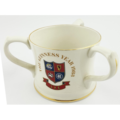 232 - 1983 GUINNESS YEAR CUP FOR LICENSED VICTUALLERS SCHOOL. 4.5ins tall. 3 different sides. CLEVEDON HOU... 