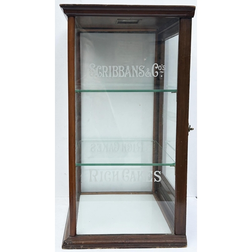 242 - SCRIBBANS & CO RICH CAKES CABINET. 27.25 x 19 x 14.5ins. Mid brown colour wood. Rear loading door (c... 