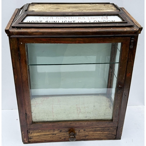 243 - PORT SUNLIGHT & LONDON BROTHERS LIMITED CABINET. 22.5 x 18.5 x 10.5ins. Mid brown wood. Milk glass p... 