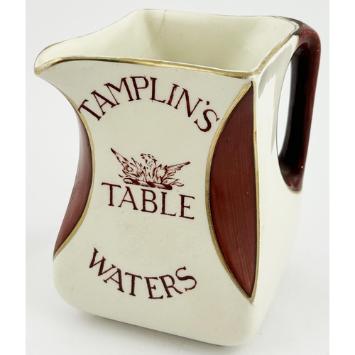 246 - TAMPLINS TALE WATERS WATER JUG. 4.7ins tall. Waisted square base shape, scalloped corners infilled w... 