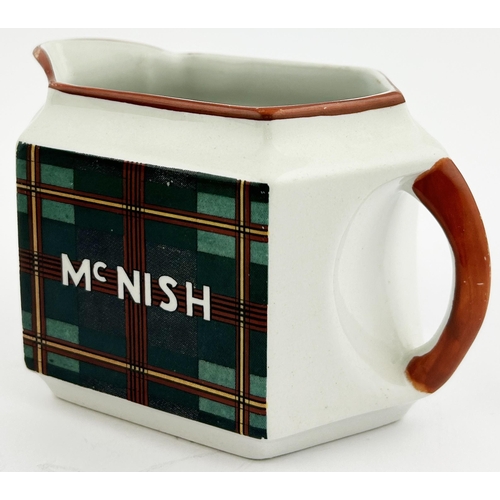 247 - McNISH WHISKY WATER JUG. 3.2ins tall. Hexagonal shape featuring colourful tartan design to 2 sides w... 