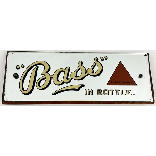 25 - BASS IN BOTTLE STAND UP MIRROR. 11.25 x 4 x 1.75. Wooden triangular block back with mirror attached.... 