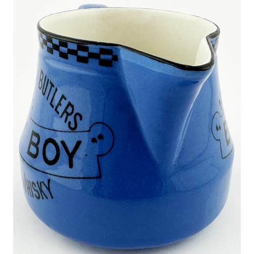 251 - MITCHELL & BUTLERS BALLY BOY WHISKY WATER JUG. 3.9ins tall. Mid blue outer body glaze, black rim dec... 