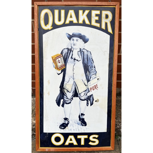 285 - QUAKER OATS FRAMED ENAMEL SIGN. 39.75 x 22ins. Blue & white background, the full size Quaker man hol... 