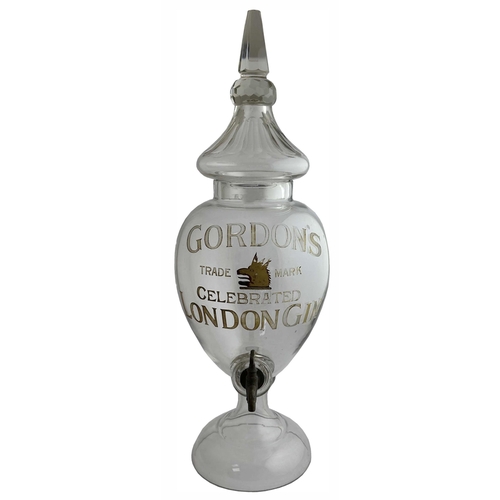 290 - GORDONS CELEBRATED GIN DISPENSER. 28ins tall. Magnificent back bar dispenser. Finial foot, bow sided... 