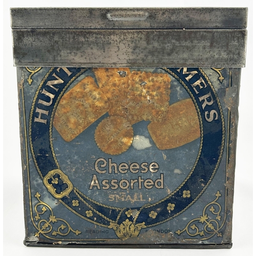 54 - HUNTLEY & PALMERS CHEESE ASSORTED BISCUIT TIN. 10.3 x 9.2 x 8.5ins. Hinged metal framed lid, glass t... 