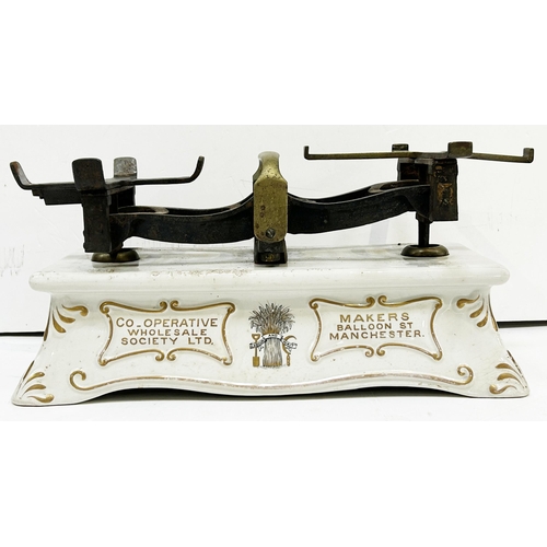 59 - CO-OPERATIVE WHOLESALE SOCIETY SCALES. 19 x 9.5 x 7.6ins. Substantial heavy duty cast & decoratively... 