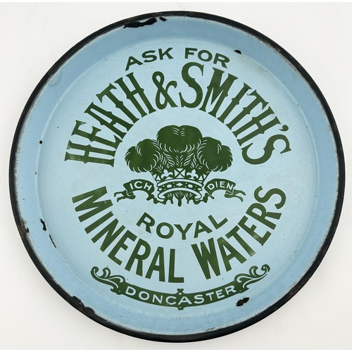 70 - HEATH & SMITHS DONCASTER ENAMEL MINERAL WATERS TRAY. 12ins diam. Early heavy metal enamelled tray, s... 