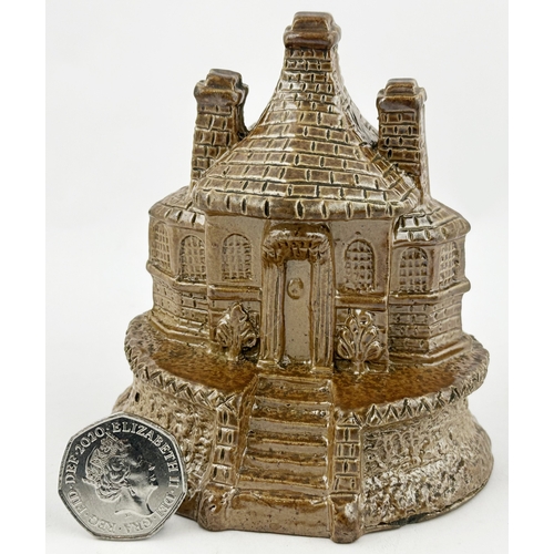 305 - HOUSE SHAPED MONEY BOX. 4.1ins tall. Chocolate brown shiny salt glaze. A very highly detailed two st... 