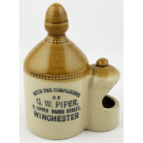 319 - WINCHESTER PROPRIETOR NAMED BIRD FEEDER. 4.4ins tall. Heavy smalll size stoneware t.t. birdcage feed... 