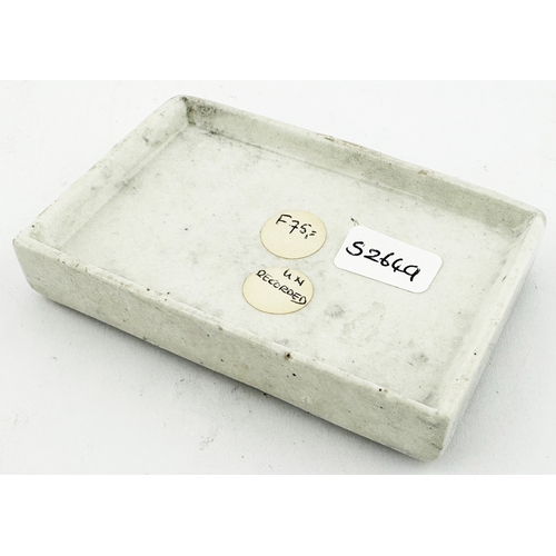 320 - LONDON ARECA NUT TOOTH PASTE POT LID. 3.1 x 2ins diam. We believe unrecorded rectangular lid in eith... 