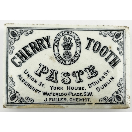 327 - LONDON CHERRY TOOTH PASTE POT LID. (APL p332, 37a) 3.6 x 2.5 ins diam. Rectangular, this the variati... 