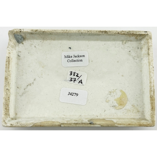 327 - LONDON CHERRY TOOTH PASTE POT LID. (APL p332, 37a) 3.6 x 2.5 ins diam. Rectangular, this the variati... 