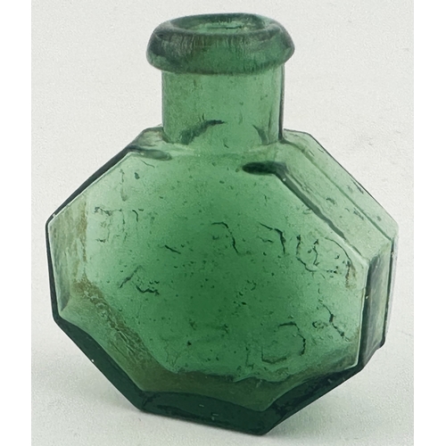 345 - NEURALINE POISON BOTTLE. (DP p40, BN1). 1.65ins tall, flattened octagonal, attractive emerald green ... 