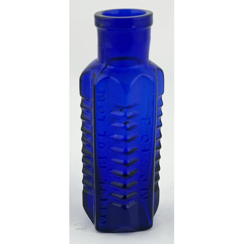 351 - STAR POISON BOTTLE. (DP p58). 4ins tall. Cobalt blue glass, embossed POISON/ NOT TO BE TAKEN with ba... 