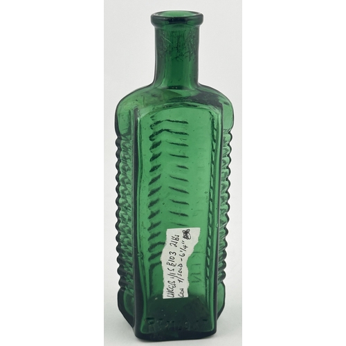 352 - STAR POISON BOTTLE. (DP p58). 6.25ins tall. Green glass, embossed POISON/ NOT TO BE TAKEN with base ... 