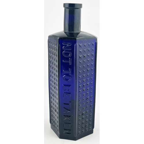 357 - FLAT BACKED POISON BOTTLE. (DP p51, SL & T2). 8.8ins tall. Cobalt blue hob nail style grids & emboss... 