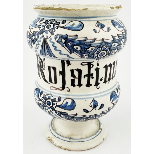 371 - TIN GLAZED DELFT STYLE DRUG JAR. 6.3ins tall. Squat dumbbell shape, hand decorated in blue & black, ... 