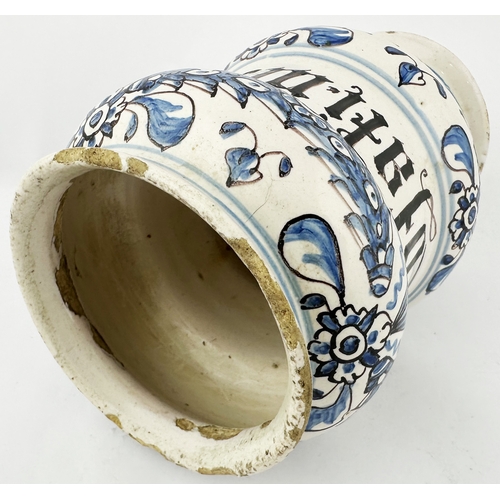 371 - TIN GLAZED DELFT STYLE DRUG JAR. 6.3ins tall. Squat dumbbell shape, hand decorated in blue & black, ... 