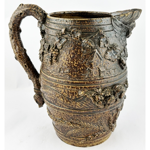 376 - EARLY DATED 1781 JUG. 5.3ins tall. An important dark brown salt glaze jug by Robert Brettingham De C... 