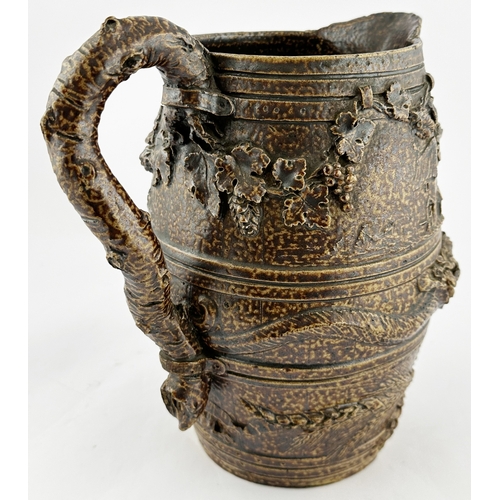 376 - EARLY DATED 1781 JUG. 5.3ins tall. An important dark brown salt glaze jug by Robert Brettingham De C... 