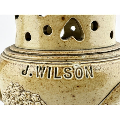 380 - BRAMPTON PERSONALISED PUZZLE JUG. 7.4ins tall. Typical mid/ golden brown salt glaze. An outstanding ... 