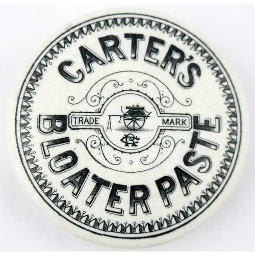 387 - CARTERS BLOATER PASTE POT LID. (APL p150,105) 4ins diam. Black transfer on white domed lid. Fancy sy... 