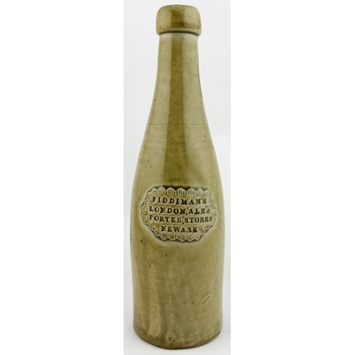 396 - NEWARK SLAB SEALED PORTER. 10.25ins. Elegant champagne shape, grey green slip glaze porter. Chunky b... 