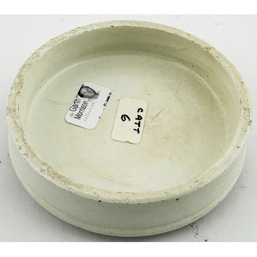 407 - PLYMOUTH POT LID. (APL p88, 76a) 2.9ins diam. Red transfer on white lid. Fancy outer border around a... 