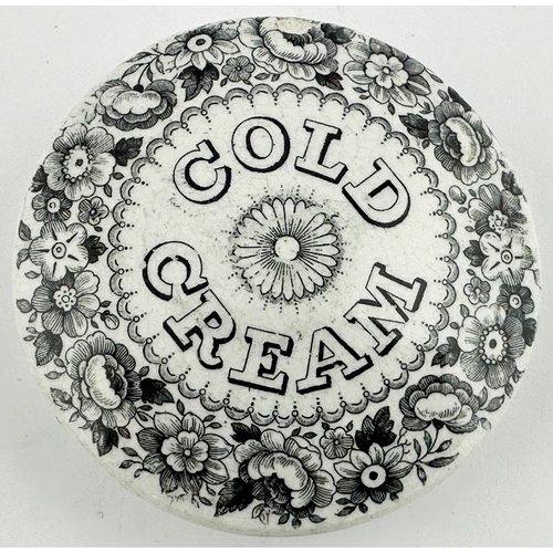 411 - GENERIC COLD CREAM POT LID. (APL p131, 65) 3.4ins diam. Black transfer with highly ornate decorative... 