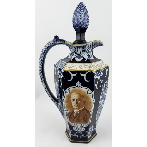 419 - WATSONS 1815-1915 COMMEMORATIVE WHISKY JUG. (WG p199). 11.1ins tall. Tapering hexagonal body, very s... 