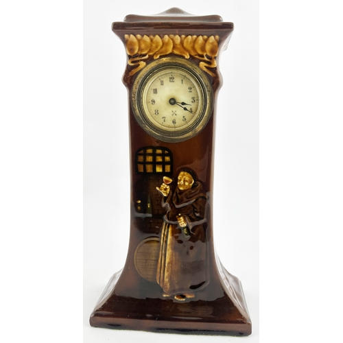 423 - KINGSWARE MONK CLOCK. (CDK p54). 12ins tall. Superb tall mid brown KIngsware type clock, flared foot... 