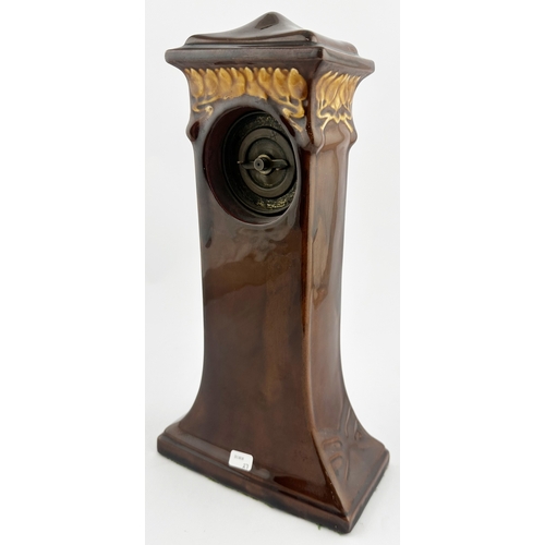 423 - KINGSWARE MONK CLOCK. (CDK p54). 12ins tall. Superb tall mid brown KIngsware type clock, flared foot... 