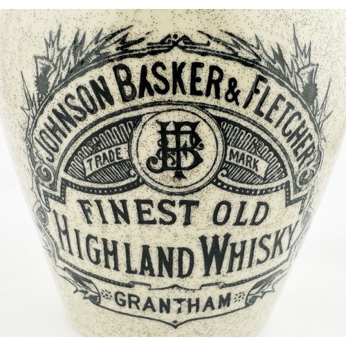 425 - GRANTHAM WHISKY JUG. (WG p103). 8ins tall. Tapering lower (glaze spackling), tan neck (slightly flar... 