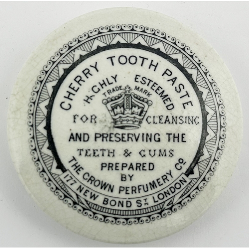 428 - LONDON TOOTH PASTE POT LID. (APL p282, 108a) 2.9ins diam. Black transfer, multiple decorative outer ... 