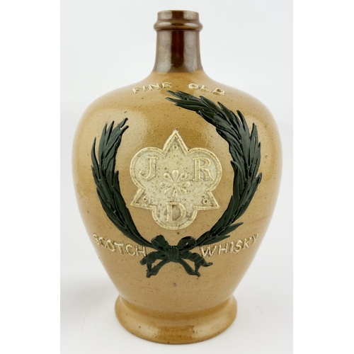 10 - DOULTON LAMBETH JRD FINE OLD SCOTCH WHISKY JUG. 7.75ins tall. Embossed to front, centre emblem, gree... 