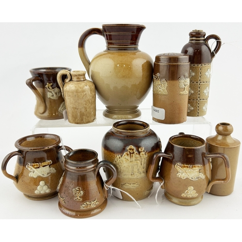 104 - MINIATURE DOULTON LAMBETH GROUP. Tallest 3.5ins. Various jugs, pepper pot, g.b., pots. Sprigged. Bas... 