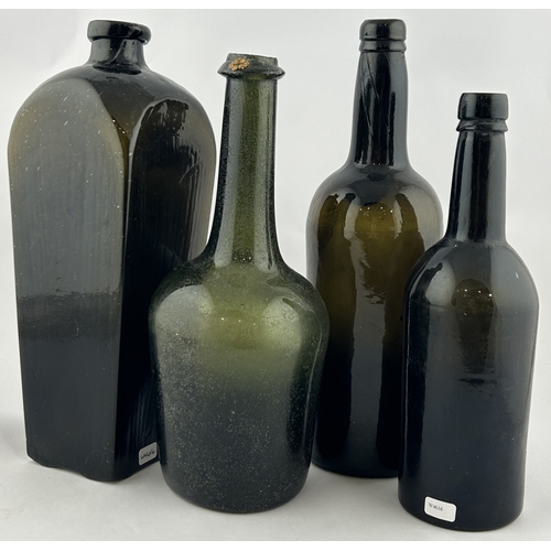 146 - BLACK GLASS GROUP. Tallest 11ins. Sealed, INNER TEMPLE & gin bottle, one plain. Base pontils. Body d... 