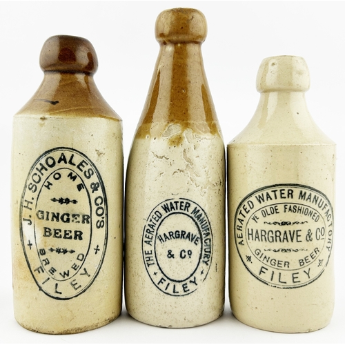 15 - FILEY GINGER BEER TRIO. Tallest 8ins. Various designs. Inc. HARGRAVE & CO, J H SCHOALES & CO & AERAT... 