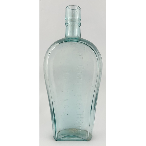 2 - HASTINGS THE CAMBRIDGE HOTEL FLASK. 9.5ins tall. Aqua glass, embossed one side. Slight lip chip.