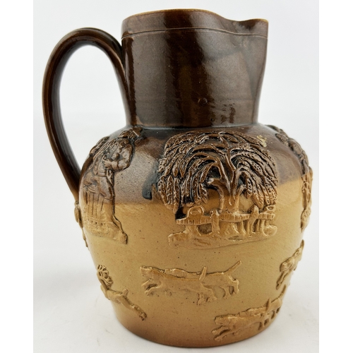 27 - SALT GLAZE HUNTING JUG. 7.25ins tall. Heavily sprigged with rear handle. Hairline to bottom of handl... 