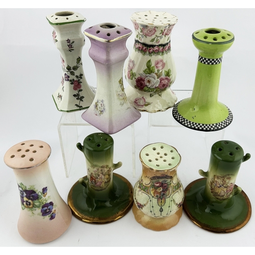 28 - CERAMIC HAT PIN HOLDERS GROUP. Tallest 4.75ins. Various floral designs, hairlines & chips. (8)