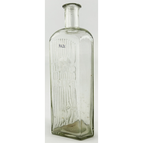 4 - POISON BOTTLE. 8.25ins tall. Clear glass, skull & cross bones motif & letters GIFT underneath, one s... 