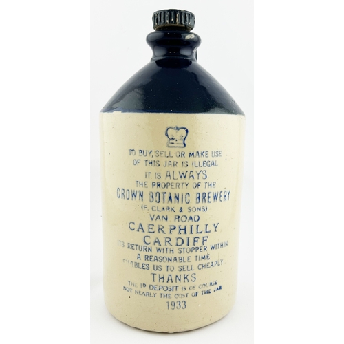 7 - CARDIFF FLAGON. 11.5ins tall. Blue top, blue transfer. CROWN BOTANIC BREWERY/ 1933. Several lines of... 