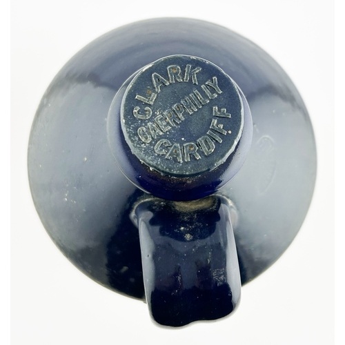 7 - CARDIFF FLAGON. 11.5ins tall. Blue top, blue transfer. CROWN BOTANIC BREWERY/ 1933. Several lines of... 